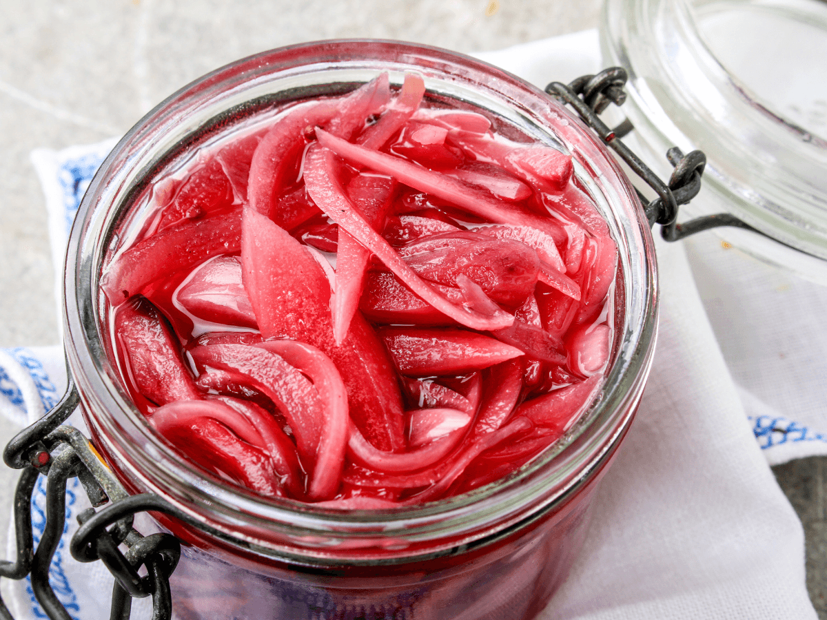 a jar of pickled red onions